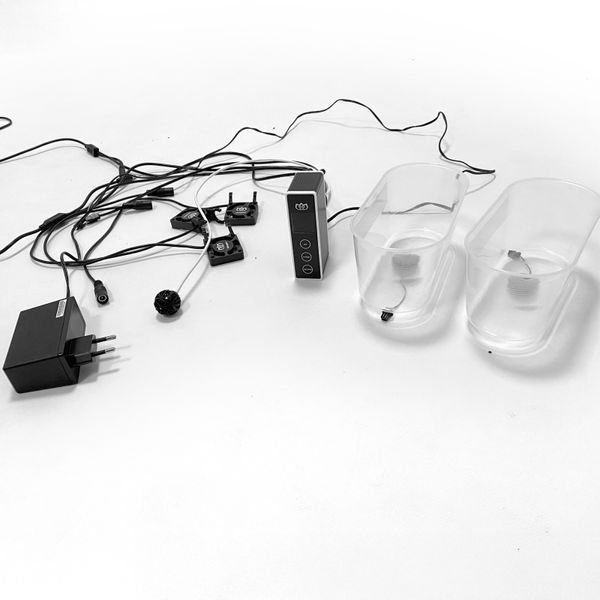 Tropic Black Mini Greenhouse with automatic humidity control, lighting control, and a timer