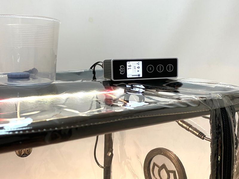 Tropic Black Mini Greenhouse with automatic humidity control, lighting control, and a timer